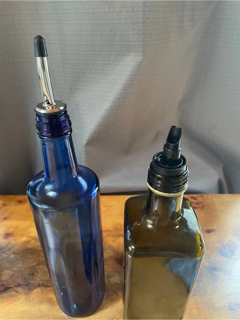 Two pour spout bottles